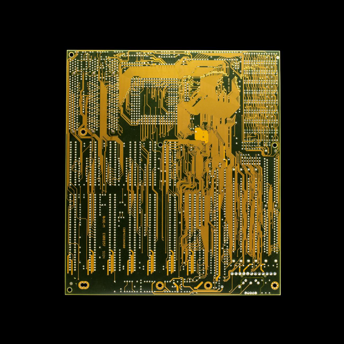 Close-up of a circuit board showcasing intricate electronic connections.